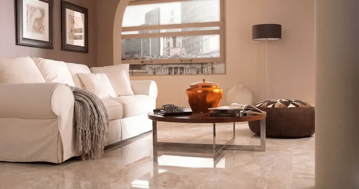 Modern living room with professionally installed marble flooring, a beige sofa, coffee table in San Antonio, TX